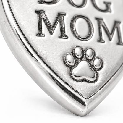 Super macro surface detail of Dog Mom Charm from a low oblique angle