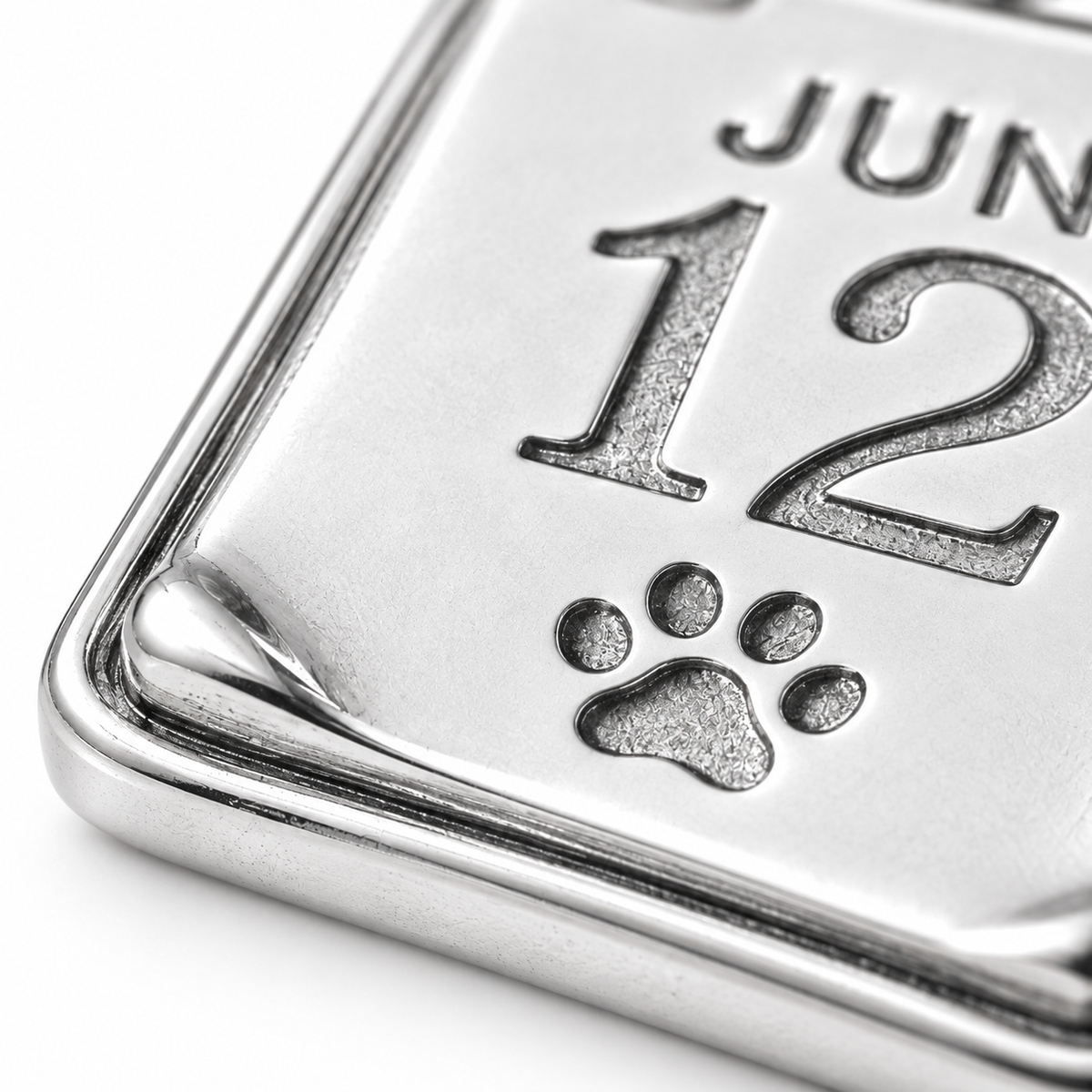 Super macro surface detail of Our Special Day Charm from a low oblique angle