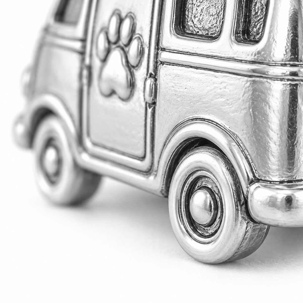 Super macro surface detail of Road Trip Buddy Charm from a low oblique angle