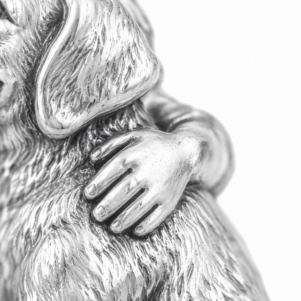 Super macro surface detail of Best Friends Charm from a low oblique angle