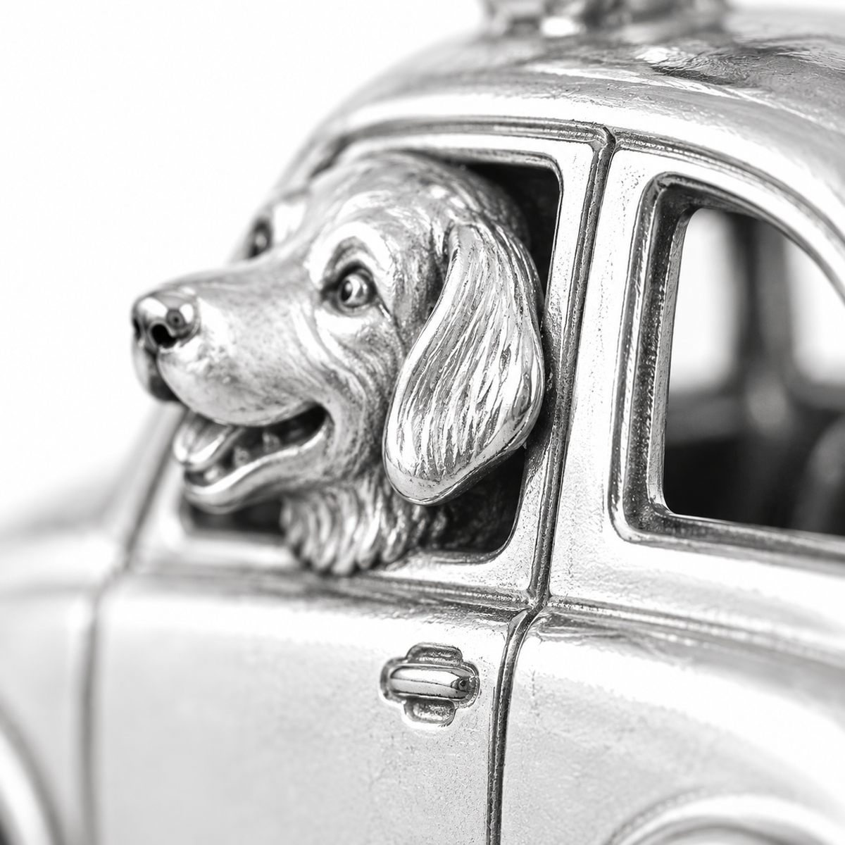 Super macro surface detail of Adventure Buddy Charm from a low oblique angle