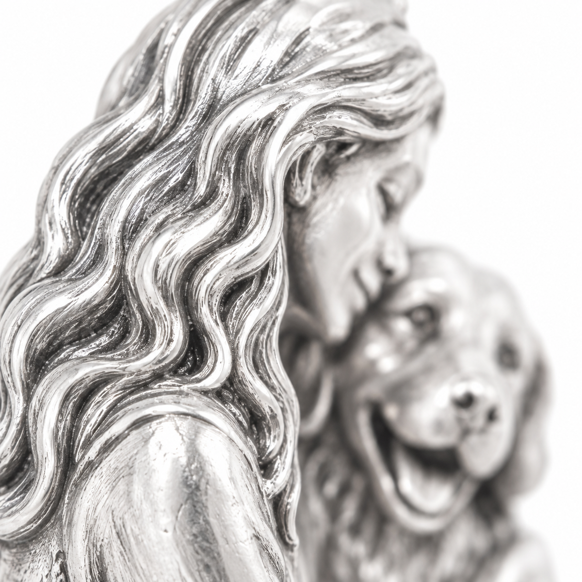Super macro surface detail of Forever By My Side Charm from a low oblique angle