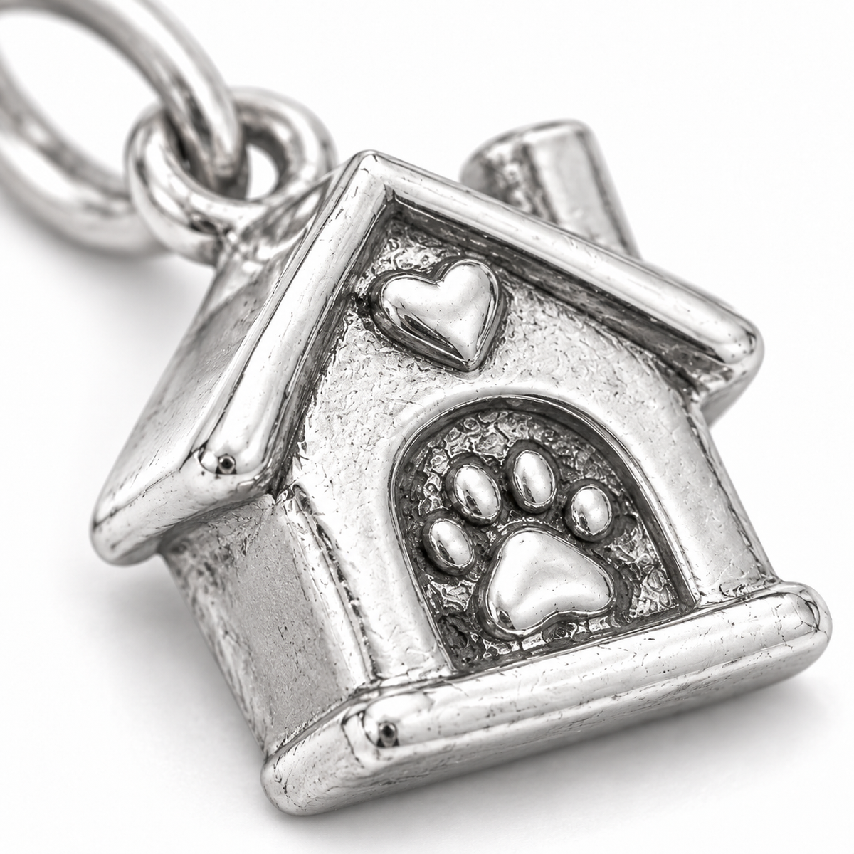 Super macro surface detail of A Place to Belong Charm from a low oblique angle