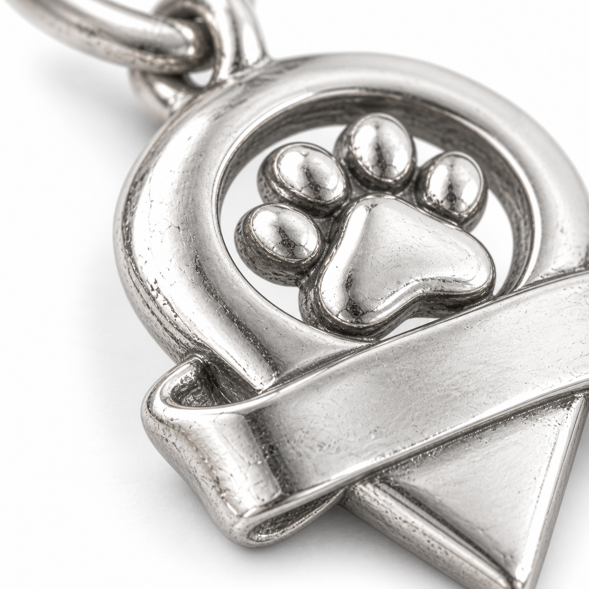 Super macro surface detail of Where Our Story Began Charm from a low oblique angle