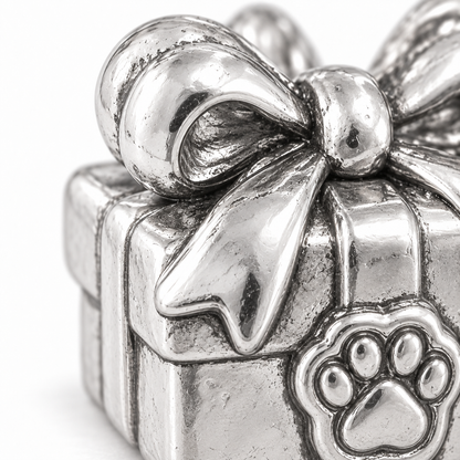 Super macro surface detail of Birthday Surprise Gift Charm from a low oblique angle