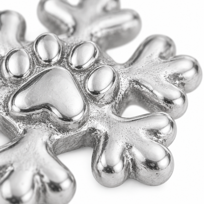 Super macro surface detail of First Snow Paw Charm from a low oblique angle