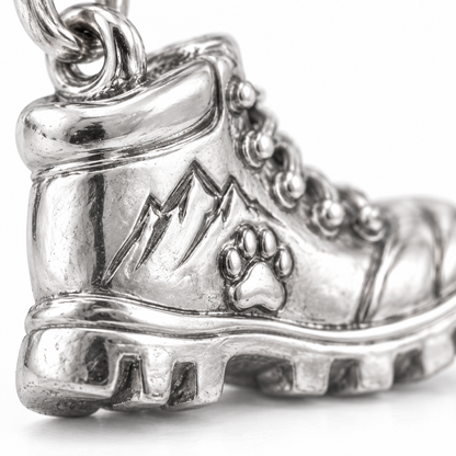Super macro surface detail of Trail Buddy Boot Charm from a low oblique angle