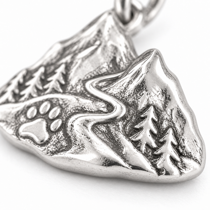 Super macro surface detail of Mountain Paws Charm from a low oblique angle