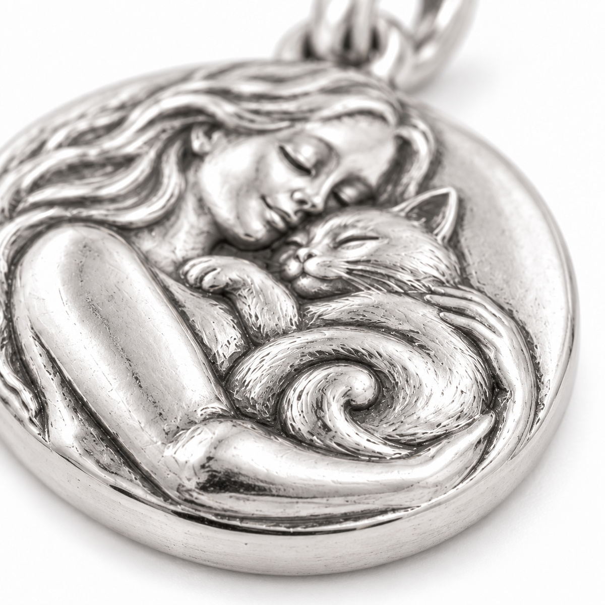 Super macro surface detail of Proud Cat Mom Charm from a low oblique angle