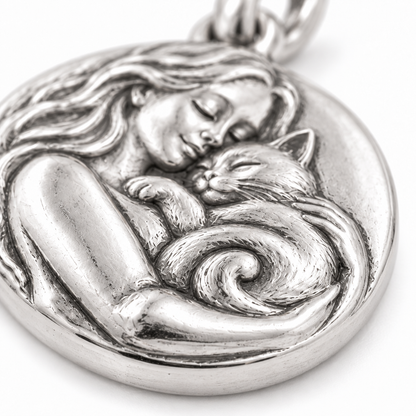 Super macro surface detail of Proud Cat Mom Charm from a low oblique angle