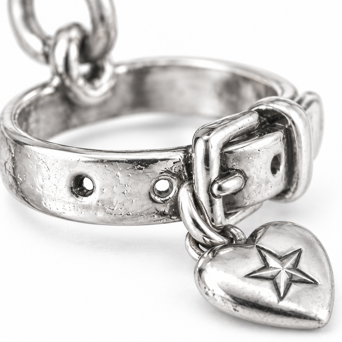 Super macro surface detail of Collar of Memories Charm from a low oblique angle