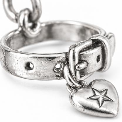 Super macro surface detail of Collar of Memories Charm from a low oblique angle