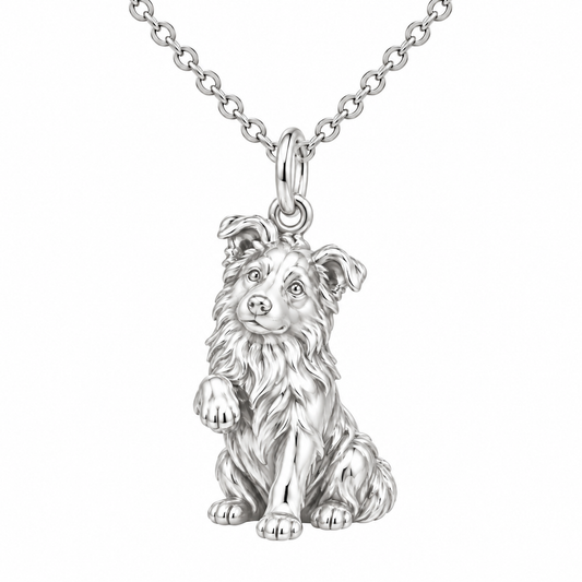 Sterling silver Australian Shepherd puppy charm pendant on a flat cable chain for dog lovers.