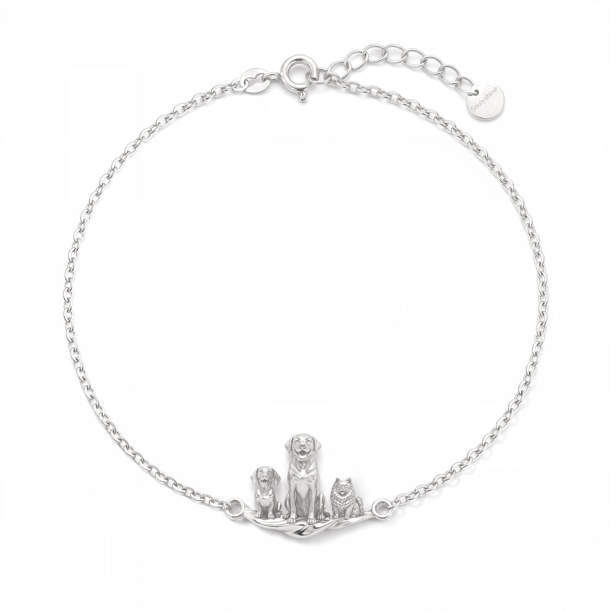 Handcrafted silver bracelet for pet lovers featuring three custom 3D dog charms and adjustable sizing links.
