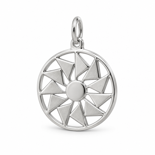Circular sterling silver Flying Geese medallion charm featuring a geometric quilt pattern with triangular cutouts.
