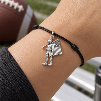 American Gridiron Pride Charm Bracelet – Personalized Athlete Gift – worn on the wrist on a black cord bracelet