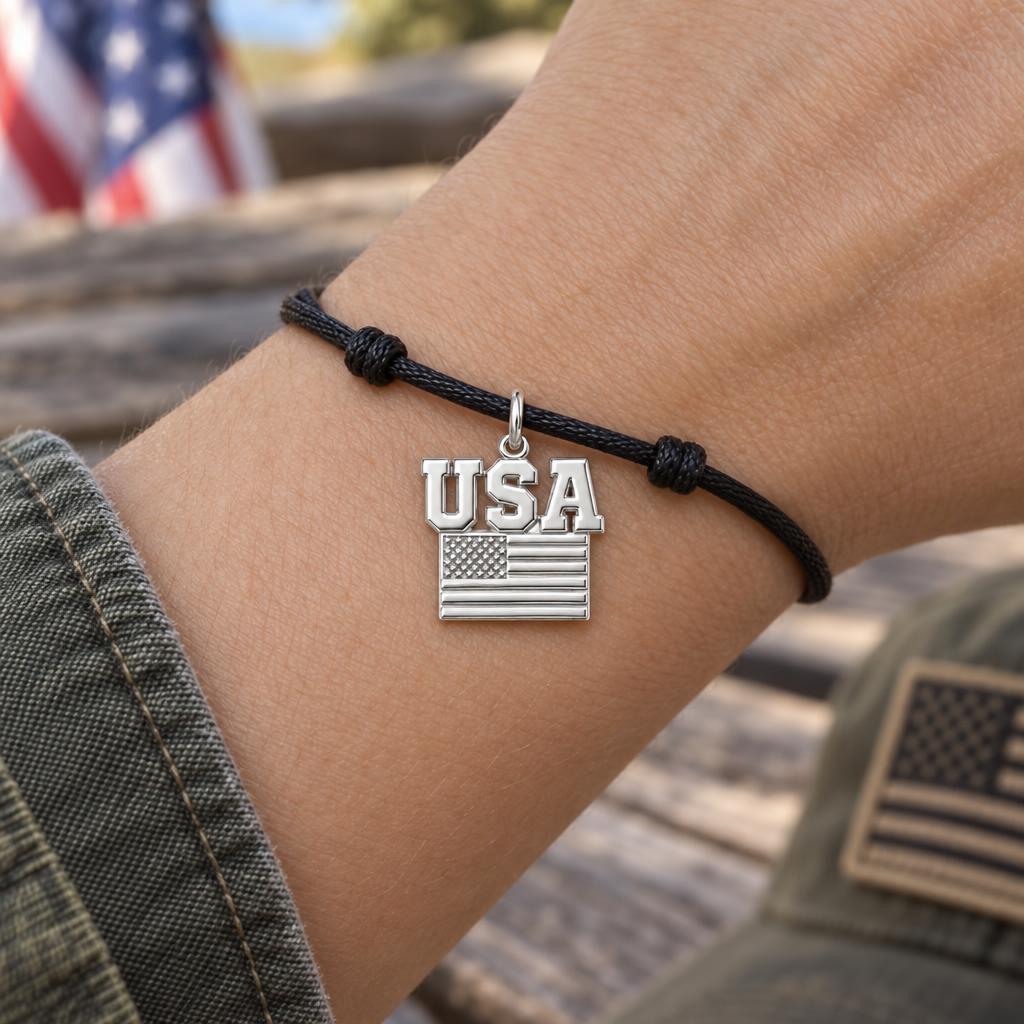 American Pride Charm Bracelet – Personalized Veteran Gift – worn on the wrist on a black cord bracelet