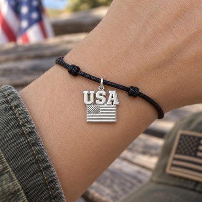 American Pride Charm Bracelet – Personalized Veteran Gift – worn on the wrist on a black cord bracelet