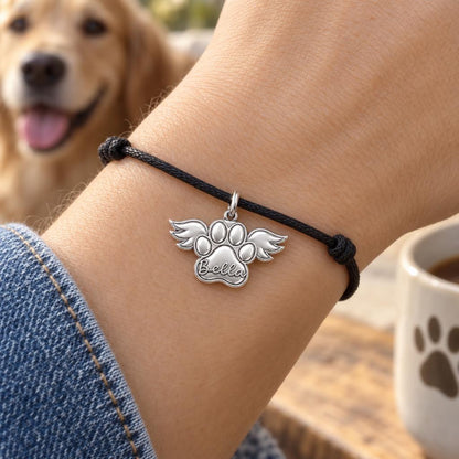Angel Wings Paw Charm Bracelet – Personalized Dog Mom Gift – worn on the wrist on a black cord bracelet