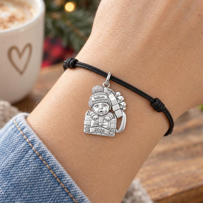 Baby's First Gift Box Charm Bracelet – Personalized Mom Gift – worn on the wrist on a black cord bracelet
