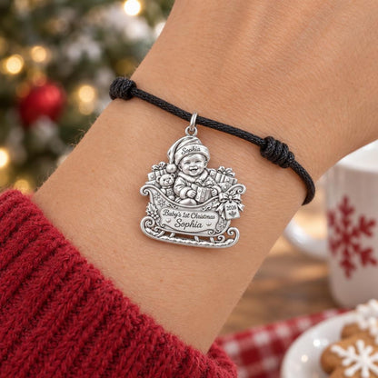 Baby's First Sleigh Ride Charm Bracelet – Personalized Mom Gift – worn on the wrist on a black cord bracelet