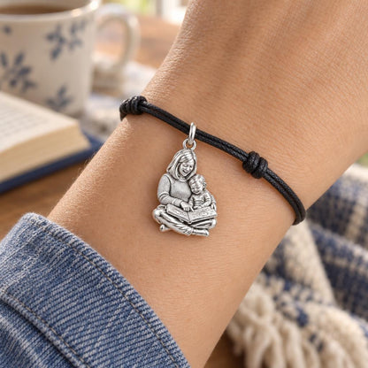 Bedtime Story Together Charm Bracelet – Personalized Nana Gift – worn on the wrist on a black cord bracelet