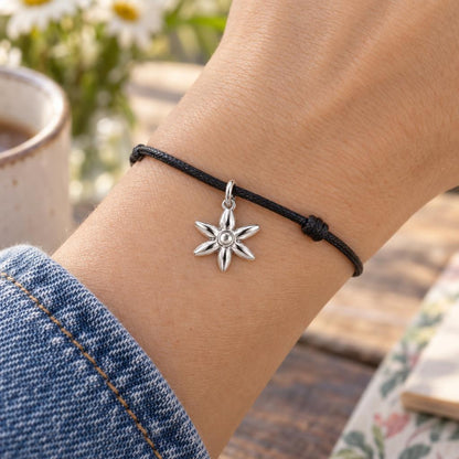 Blooming Wildflower Charm Bracelet – Personalized Mom Gift – worn on the wrist on a black cord bracelet