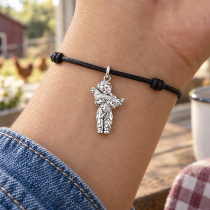Boy Hugging Chicken Charm Bracelet – Personalized Mom Gift – worn on the wrist on a black cord bracelet