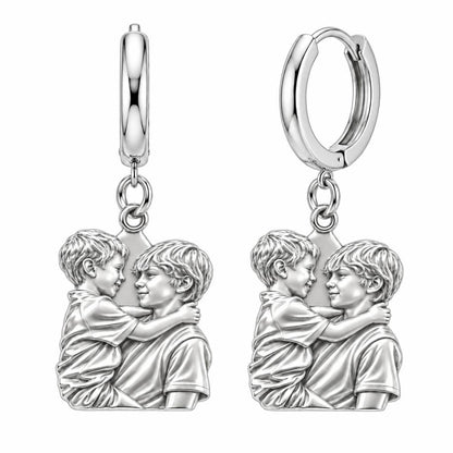 Brothers Eternal Hug Huggie Charm Earrings – silver, front view
