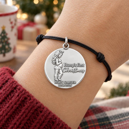 Bump's First Christmas Charm Bracelet – Personalized Mom Gift – worn on the wrist on a black cord bracelet