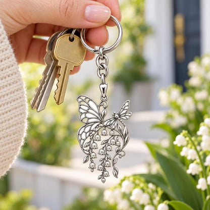 Butterfly and Lily of the Valley Charm Keychain – worn / in use