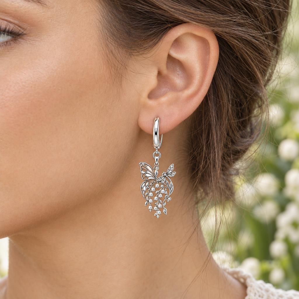 Butterfly and Lily of the Valley Huggie Charm Earrings – worn / in use