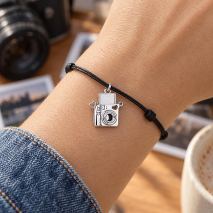 Captured Moments Camera Charm – Personalized Photographer Gift – worn on the wrist on a black cord bracelet