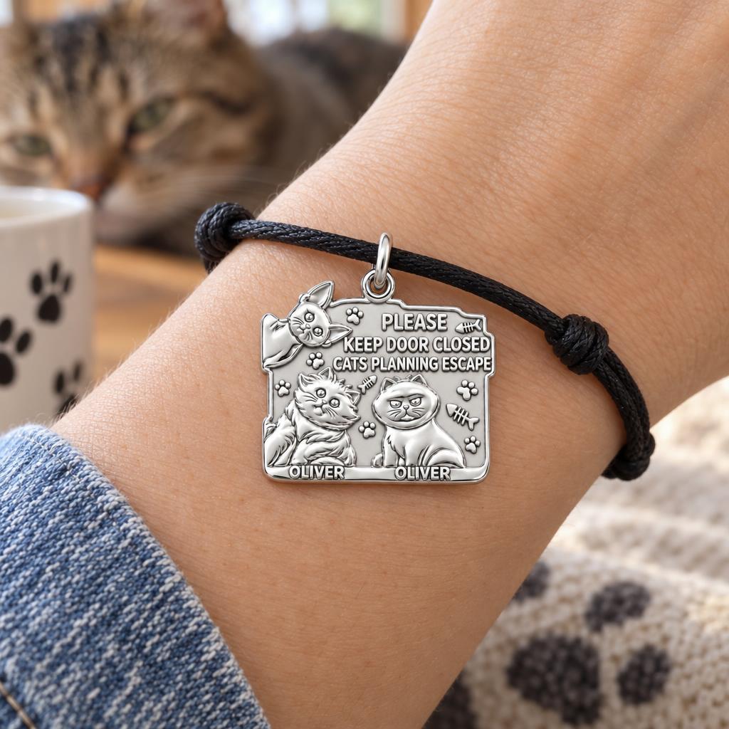 Cat Escape Artist Charm Bracelet – Personalized Cat Mom Gift – worn on the wrist on a black cord bracelet