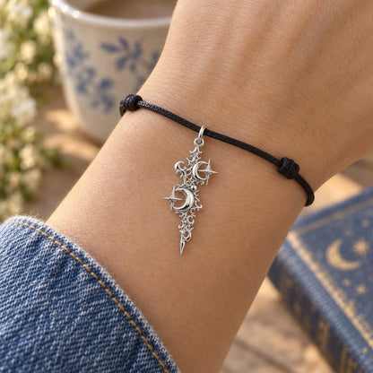 Celestial Twin Moons Charm Bracelet – Personalized Mom Gift – worn on the wrist on a black cord bracelet
