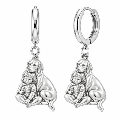 Child and Loyal Companion Huggie Charm Earrings – silver, front view