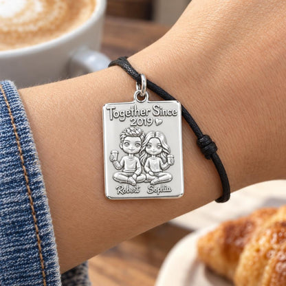 Cozy Coffee Date Charm Bracelet – Personalized Couple Gift – worn on the wrist on a black cord bracelet