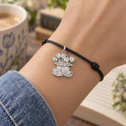 Cozy Morning Tulips Charm Bracelet – Personalized Book Mom G – worn on the wrist on a black cord bracelet