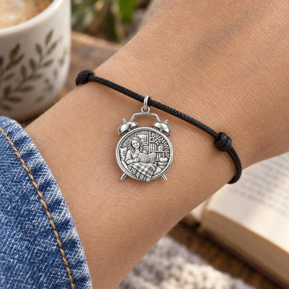 Cozy Reading Nook Charm Bracelet – Personalized Book Lover Gift – worn on the wrist on a black cord bracelet