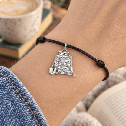 Cozy Stack of Stories Charm Bracelet – Personalized Book Mom Gift – worn on the wrist on a black cord bracelet