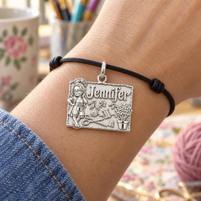 Craft Room Sanctuary Charm Bracelet – Personalized Crafter Gift – worn on the wrist on a black cord bracelet