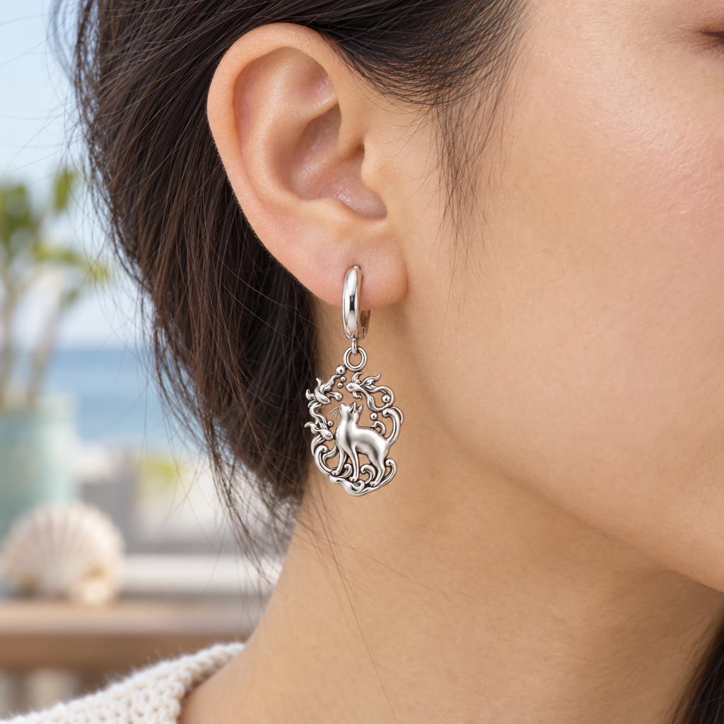 Curious Cat and Goldfish Huggie Charm Earrings – worn / in use