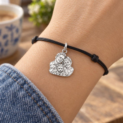 Custom Hand Sculpted Portrait Charm Bracelet – Personalized Gift – worn on the wrist on a black cord bracelet