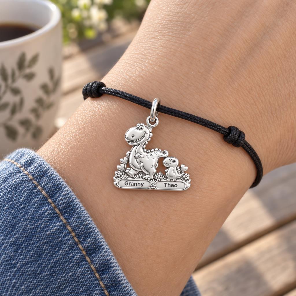 Dino Duo Stroll Charm Bracelet – Personalized Grandma Gift – worn on the wrist on a black cord bracelet