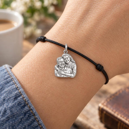 Eternal Embrace Photo Charm Bracelet – Personalized Couple Gift – worn on the wrist on a black cord bracelet