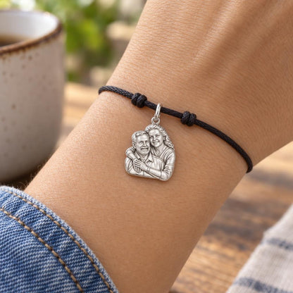Eternal Embrace Photo Charm Bracelet – Personalized Couple Gift – worn on the wrist on a black cord bracelet