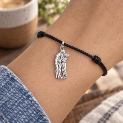 Eternal Embrace Photo Charm Bracelet – Personalized Couple Gift – worn on the wrist on a black cord bracelet