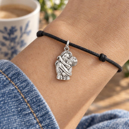 Eternal Hug Charm Bracelet – Personalized Mom Gift – worn on the wrist on a black cord bracelet