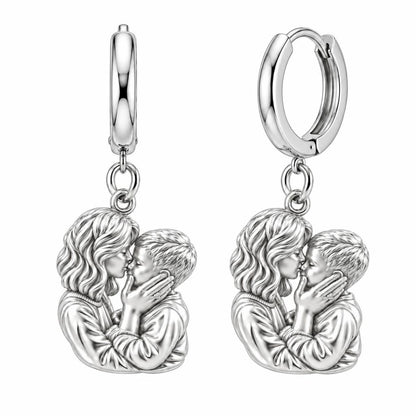 Eternal Motherhood Embrace Huggie Charm Earrings – silver, front view