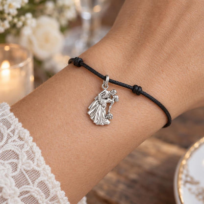 Eternal Wedding Dip Kiss Charm Bracelet – Personalized Couple Gift – worn on the wrist on a black cord bracelet